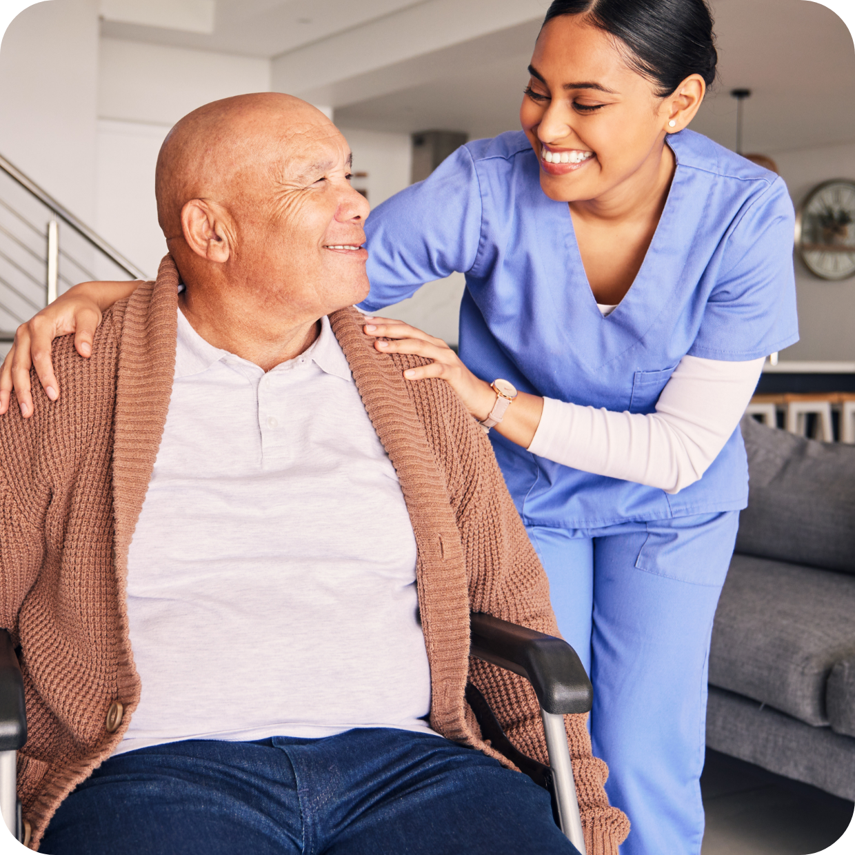 Nurse assisting disabled man