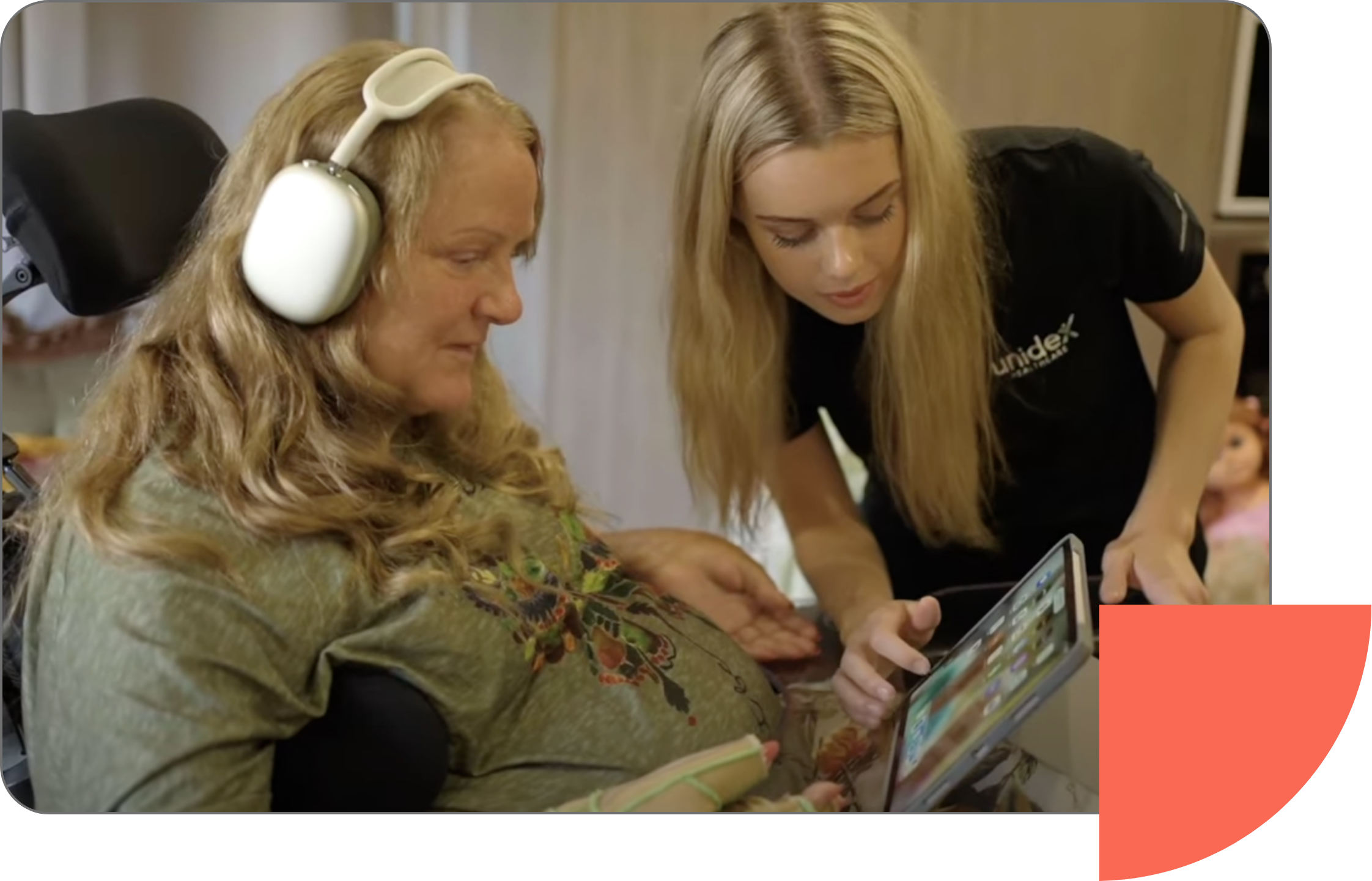 Unidex nurse helping woman with headphones