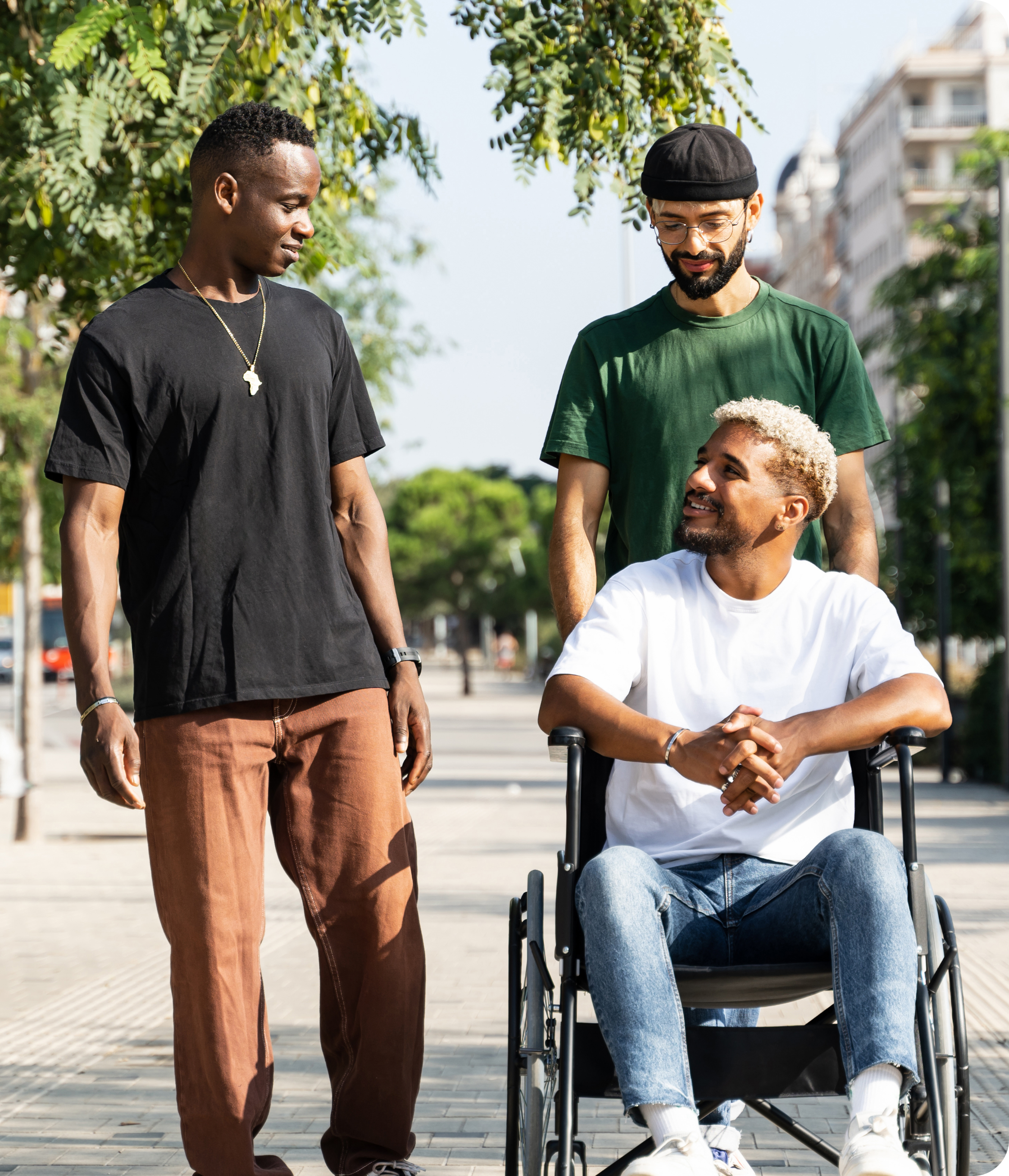 Happy friends with disabled man